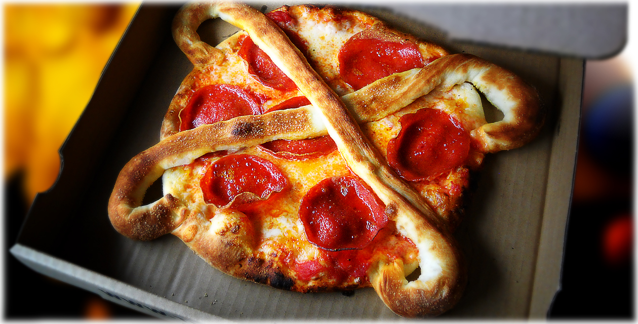 Pizza shaped planet with orbiting breadstick rings