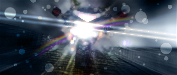 Close-up of motorcycle racing toward RIX